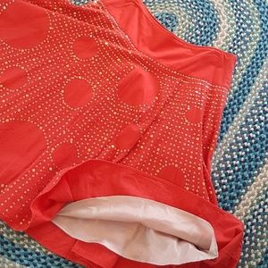 Basil & Maude  orange sequined skirt